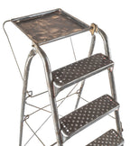 american depression era antique industrial reinforced tubular brushed metal collapsible ladder with riveted joint rungs or steps and oversized raised edge tray