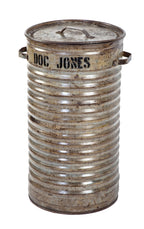 lightly cleaned and sealed american industrial "doc jones" reinforced ribbed steel factory trash can later used as a bird seed barrel for a local veterinarian clinic