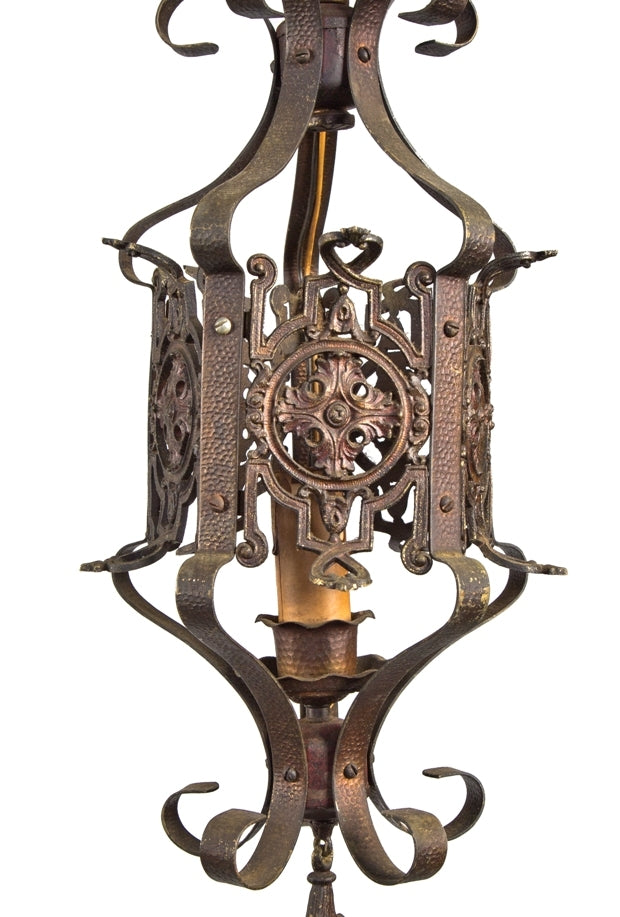 rewired c. 1920's spanish revival style chicago bungalow interior residential cast brass hallway pendant light with original surface finish