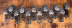 large lot of original early 20th century pressed or stamped ornamental copper-plated steel interior residential salvaged chicago matching backplates and doorknobs