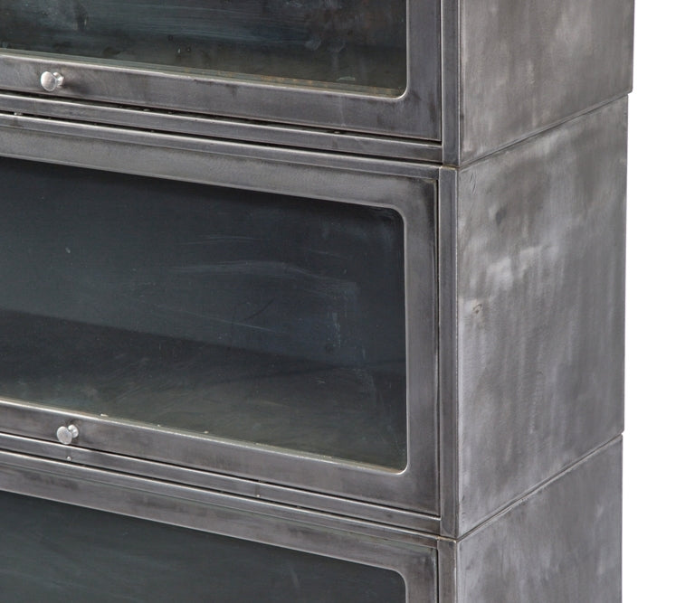 highly desirable vintage american industrial stackable three-tier brushed metal barrister bookcase with original cabinet door glass, top or crown, and four-legged base