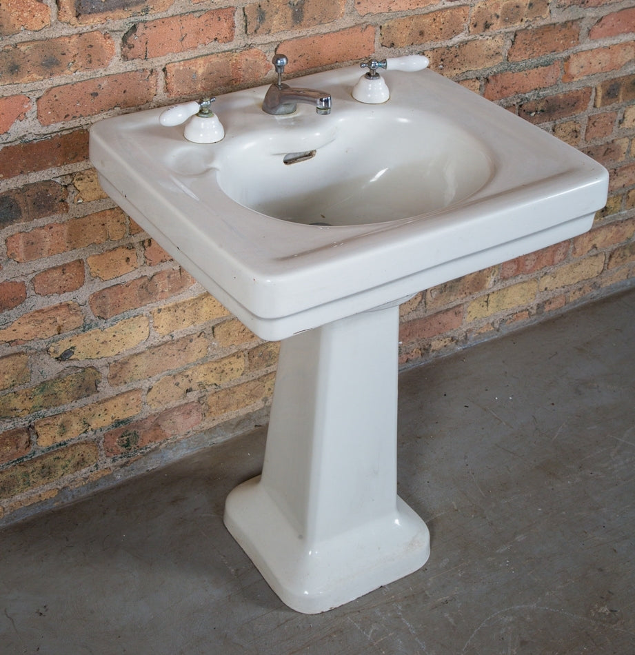 completely intact all original salvaged chicago early 20th century antique american residential lavatory sink with tapered base and porcelain hot and cold handles