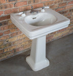 completely intact all original salvaged chicago early 20th century antique american residential lavatory sink with tapered base and porcelain hot and cold handles