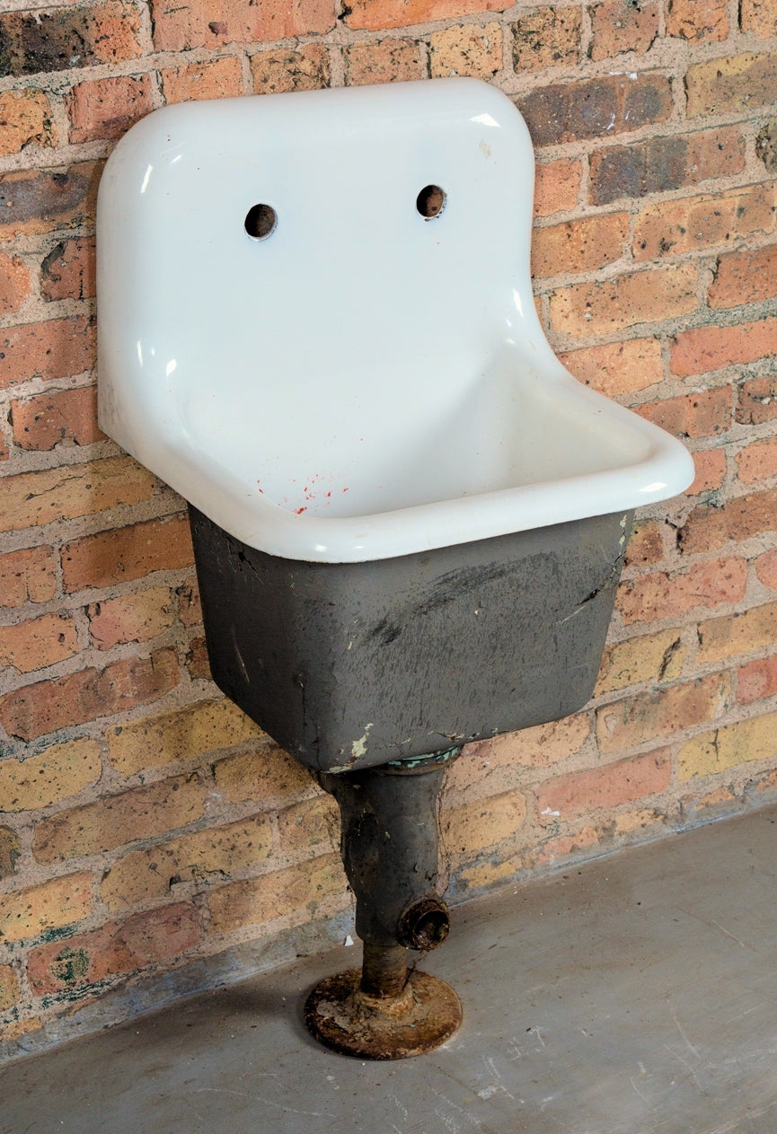 early 20th century antique american industrial wall-mount heavy duty salvaged chicago commercial building wall-mount closet sink with white porcelain enameled finish