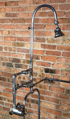 unusual early 20th century highly sought after wall-mount interior residential "needle" type nickel plated tubular brass shower surround with head and valve mixer