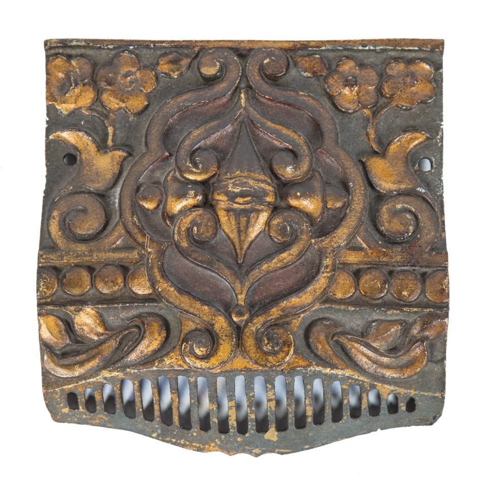 c. 1920's diminutive american ornamental cast iron interior historic oriental theater theater seat end cover plate with original polychromatic enameled finish