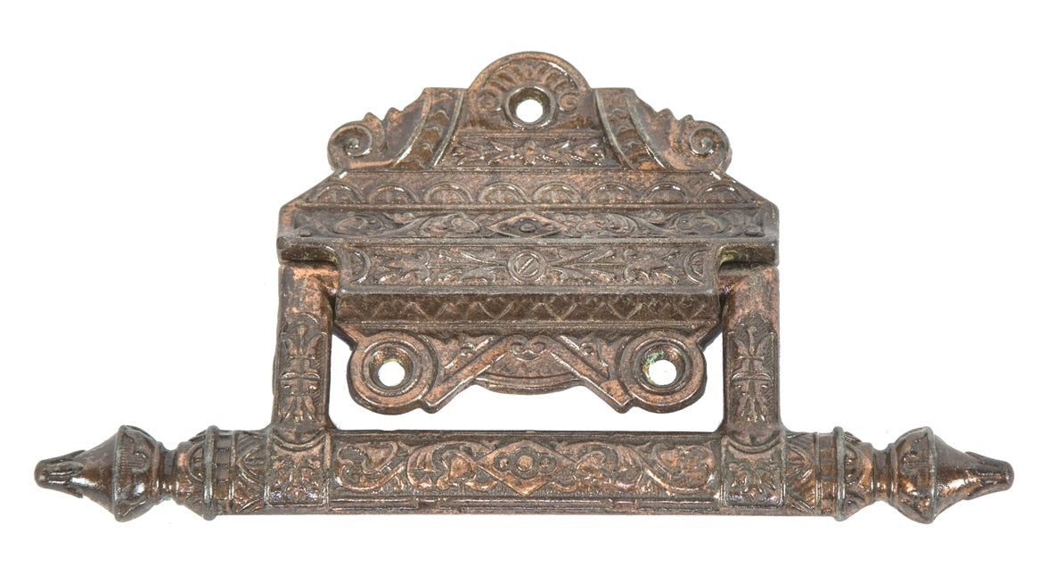 original and intact 19th century american victorian era oversized copper-plated cast iron casket or coffin drop handle with fanciful backplate and pull