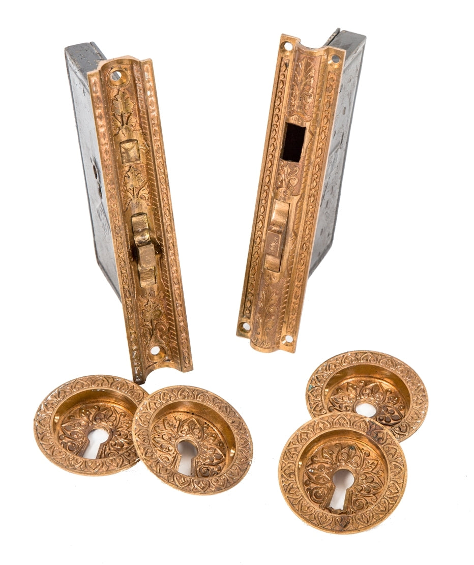 hard to find original and fully functional early 1870's cast bronze interior residential pocket door circular escutcheons with matching mortise locks