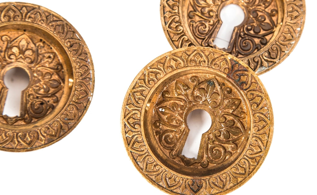 hard to find original and fully functional early 1870's cast bronze interior residential pocket door circular escutcheons with matching mortise locks