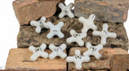 group of original late 19th or early 20th century salvaged chicago white china or porcelain cross-arm faucet handles for sink, shower, or bathtub