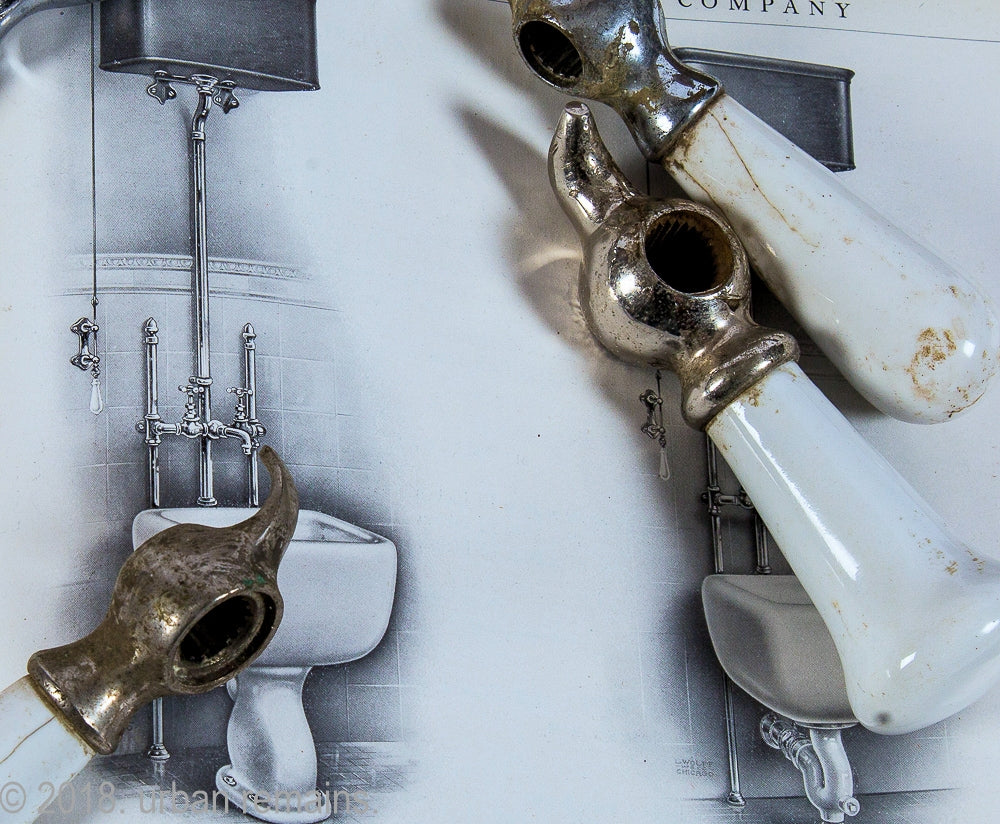 original late 19th or early 20th century antique american oversized interior residential white porcelain or china toilet closet pull handles with nickel-plated brass hardware