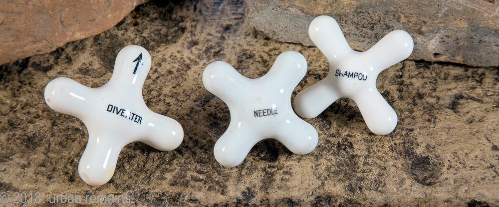 group of three rare late 19th or early 20th century white porcelain or china cross-arm interior residential bathroom needle shower handles