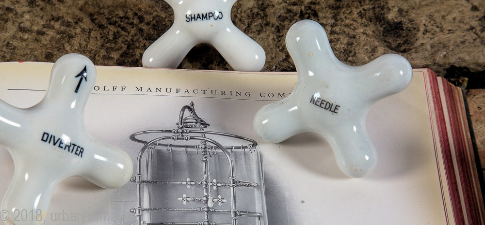group of three rare late 19th or early 20th century white porcelain or china cross-arm interior residential bathroom needle shower handles