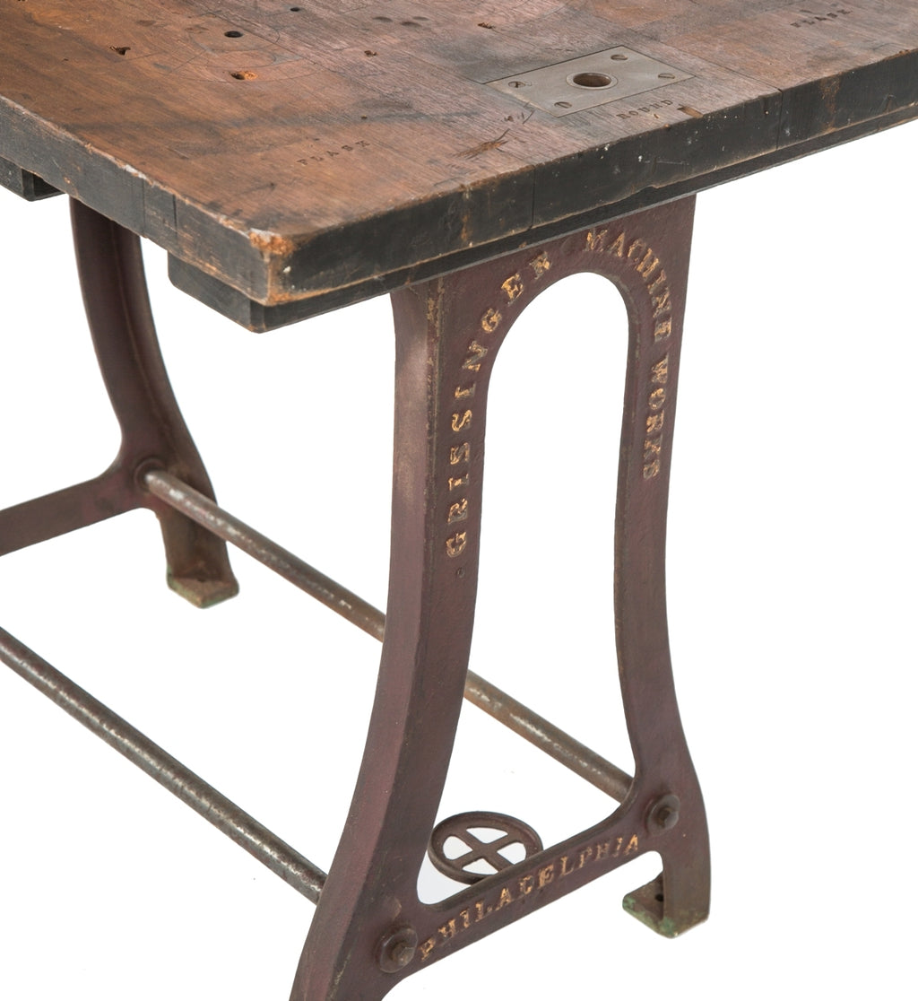 remarkable late 19th or early 20th century antique american industrial machine shop table with curvesous cast iron legs and nicely weathered and worn tabletop