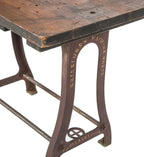 remarkable late 19th or early 20th century antique american industrial machine shop table with curvesous cast iron legs and nicely weathered and worn tabletop