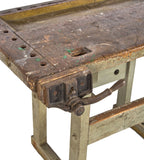 late 19th or early 20th century highly sought after christiansen reinforced hardwood four-legged factory workbench with original cast iron vise