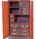 rare all original and fully functional oversized heavily compartmentalized all-metal cole portable office with desk, drawers, cubby holes, and safe with original combination