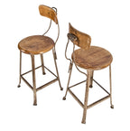 pair of matching weathered and worn numbered stationary salvaged chicago tool and die factory machinist stools with original maple wood seats and contoured backrests