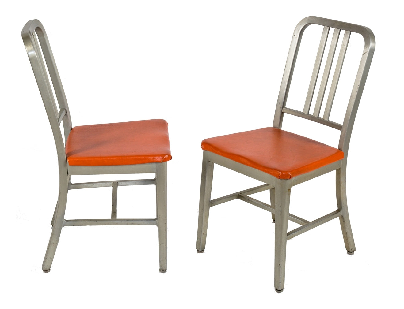 matching set of vintage midcentury modern salvaged chicago factory office brushed aluminum steel case side chairs with original orange foam-cushioned cushions
