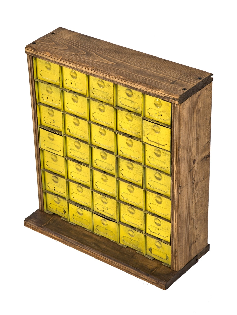 repurposed freestanding c. 1940's salvaged chicago stackable "small parts" yellow enameled steel cabinet containing 35 matching pull-out drawers