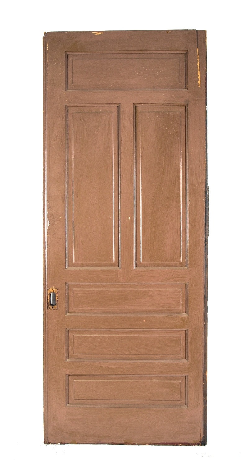 original oversized late 19th century chicago graystone interior residential oak wood sliding pocket door with uniform light brown enameled finish