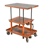 fully adjustable and thoroughly cleaned salvaged chicago three-tier heavy duty die cart or hand-crank table with perforated cast iron casters
