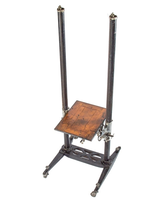 early 20th century antique american depression era oversized dearorff mobile 8 x 10 view camera stand or tilting crank table with turned wood handles and upright posts with counter-weights