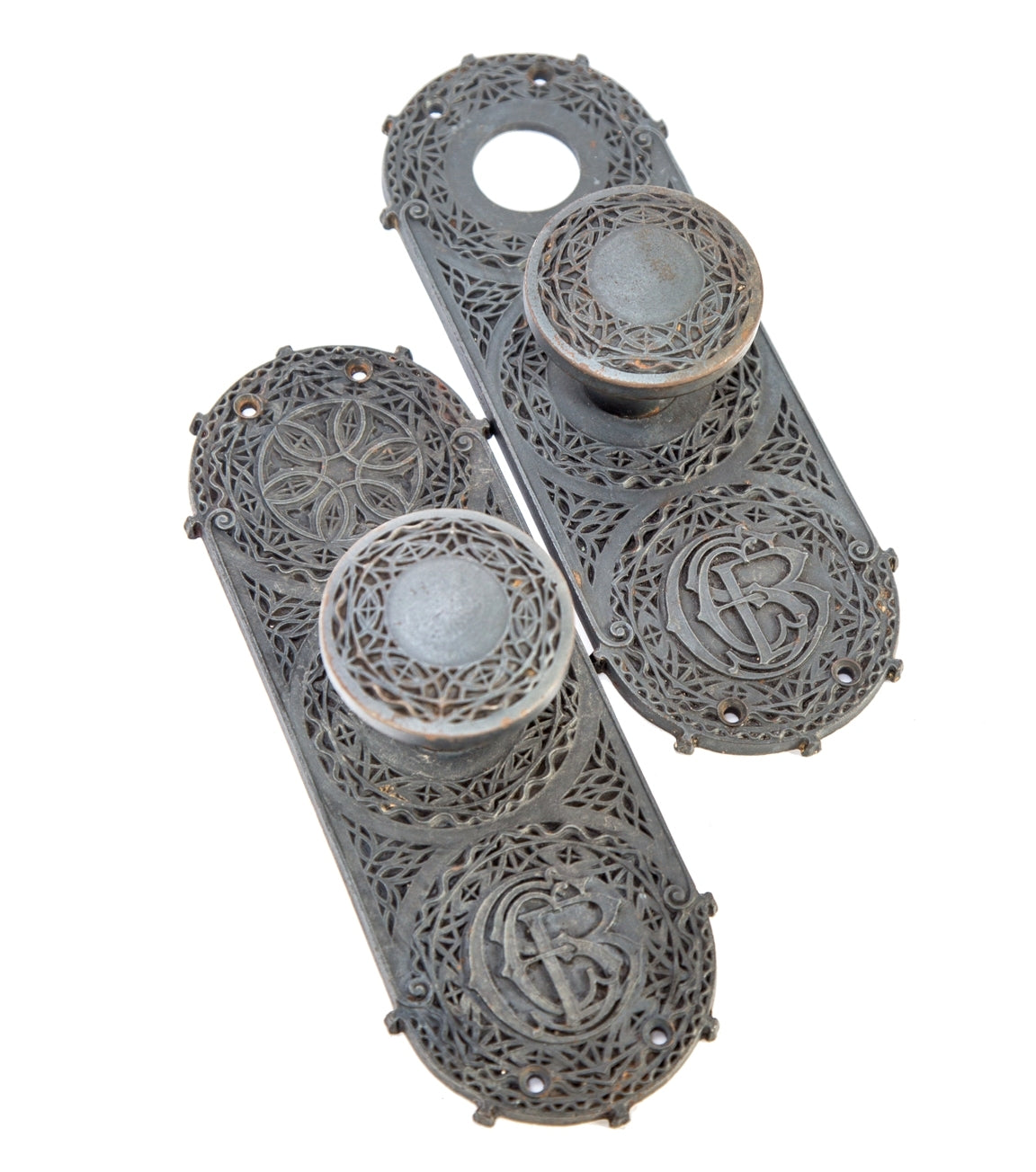 matching set of original museum-quality 1894 ornamental cast iron chicago stock exchange monogrammed backplates with matching oversized doorknobs