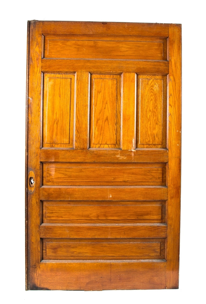 original oversized late 19th century double-sided antique american salvaged chicago interior residential solid oak wood sliding pocket door with largely intact varnished finish