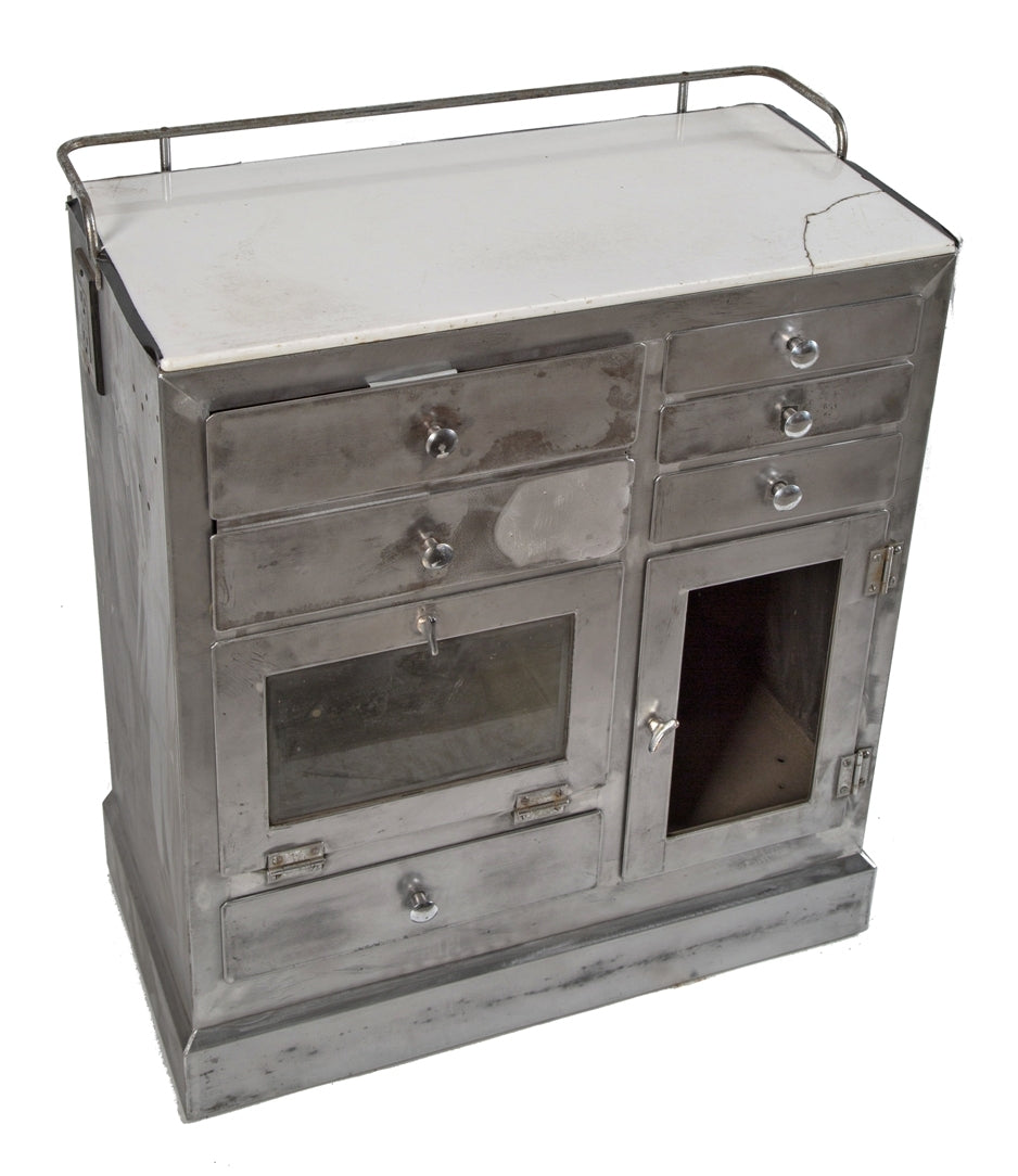 original early 20th century antique american brushed cold-rolled steel salvaged chicago medical cabinet with multiple drawers, white vitrolite glass and rail-guard