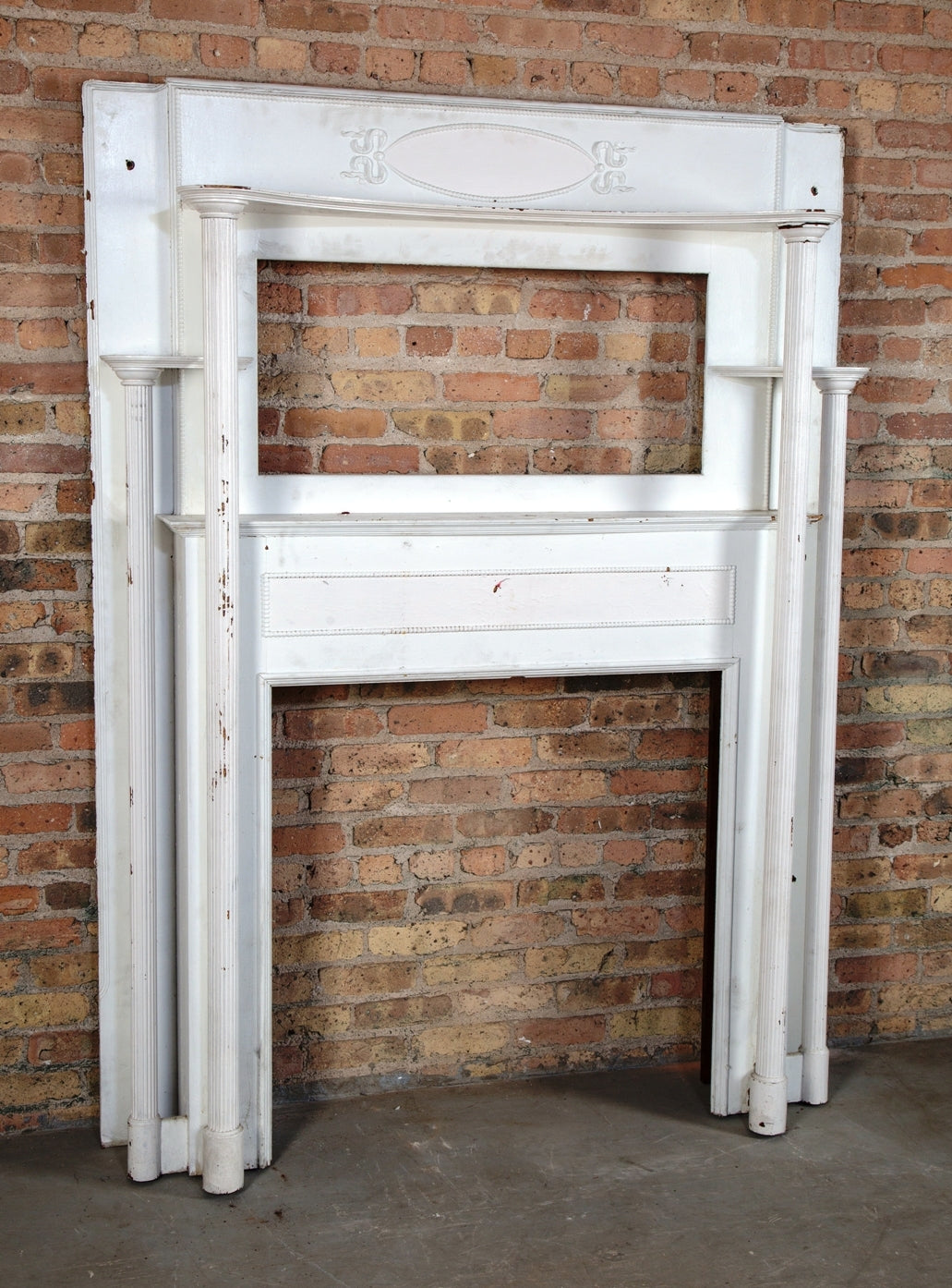 late 19th or early 20th century quartered oak wood salvaged chicago fireplace mantel with two sets of fluted columns and original beveled edge mirror