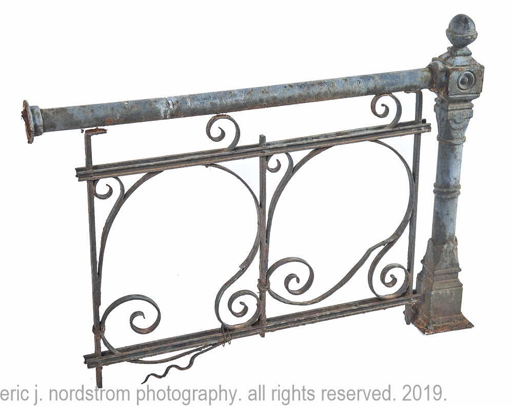 original 19th century ornamental freestanding cast iron newel post and matching wrought iron railing salvaged from a chicago three-flat graystone