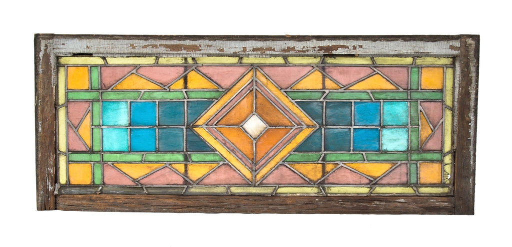 hard to find early 1880's salvaged chicago strongly geometric richly colored cathedral glass residential transom window with original frame