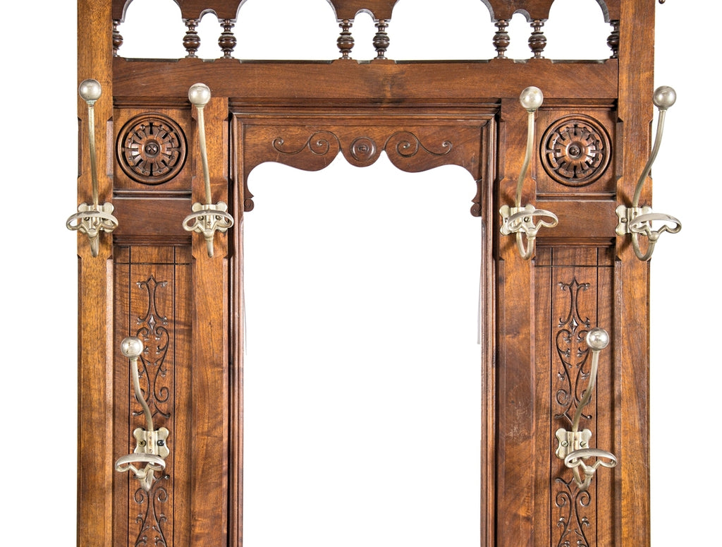 original late 19th century american eastlake or aesthetic style varnished solid walnut wood interior vestibule hall tree with oversized nickel-plated hooks and beveled mirror