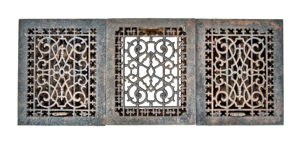 group of three matching ornamental cast iron late 19th century louvered salvaged chicago floor or wall registers with black enameled finish