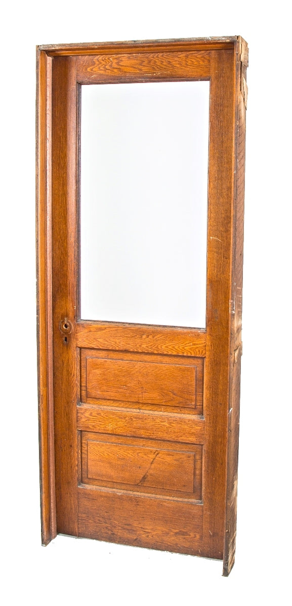 early 20th century salvaged chicago quartered oak wood interior residential vestibule door with original heavy beveled edge plate glass pane and original varnished finish