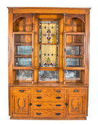 remarkable 19th century all original and intact salvaged chicago gold coast mansion varnished oak wood interior built-in cabinet with centrally located double-hung stained glass window