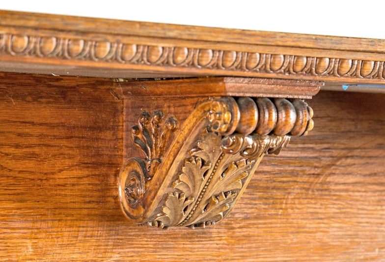 all original late 19th century golden oak wood freestanding double-door bookshelf cabinet with beveled edge glass and original ornamental hardware with matching skeleton cabinet key