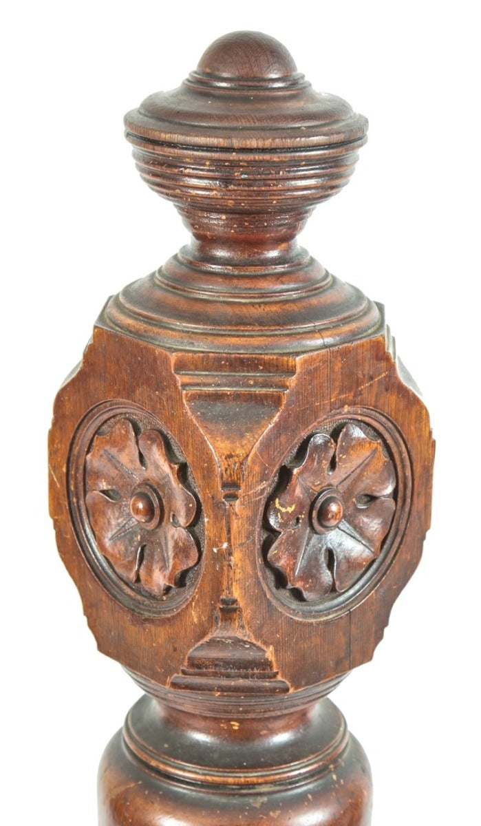 nicely turned and tapered 19th century antique american victorian era solid oak wood interior residential newel post with hand carved floral rosettes and graduating rings