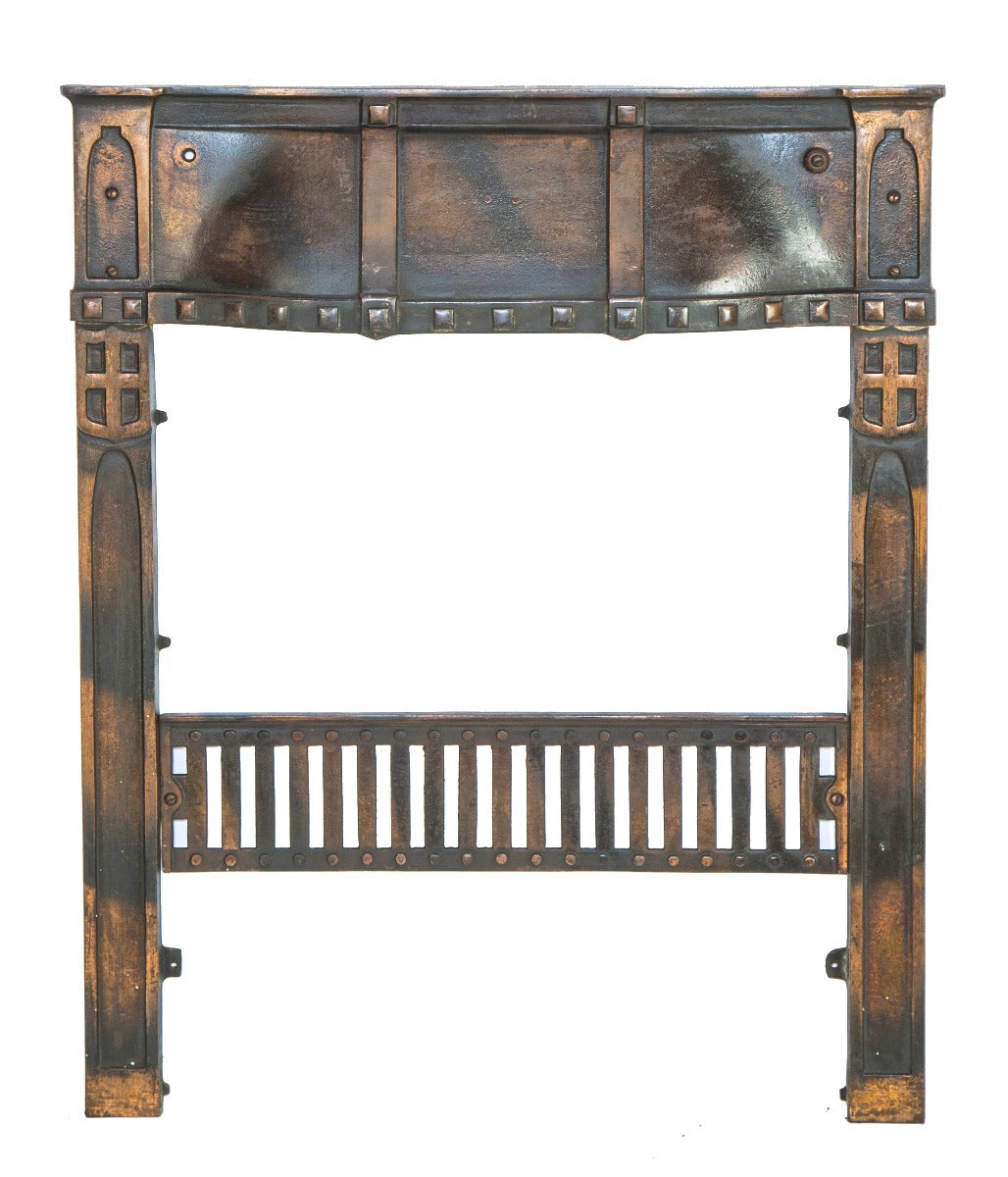hard to find early 20th century craftsman or mission style copper-plated ornamental cast iron residential fireplace surround