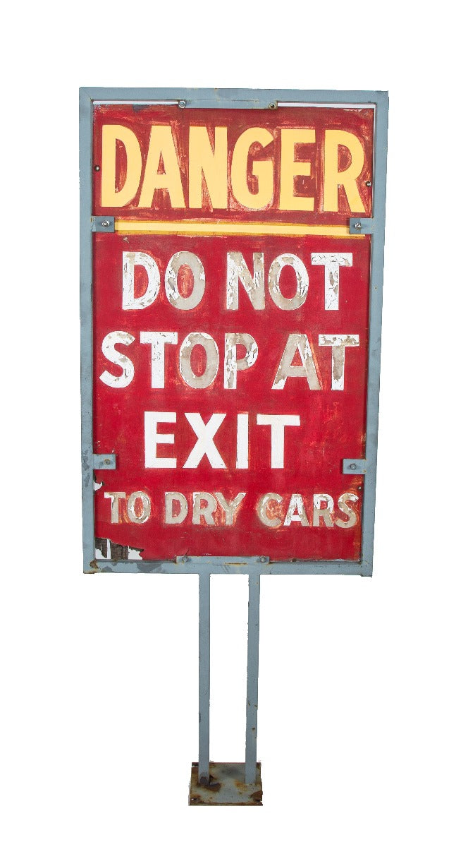 oversized custom-built salvaged chicago star car wash "danger" sign with welded-joint metal stand and bold lettering