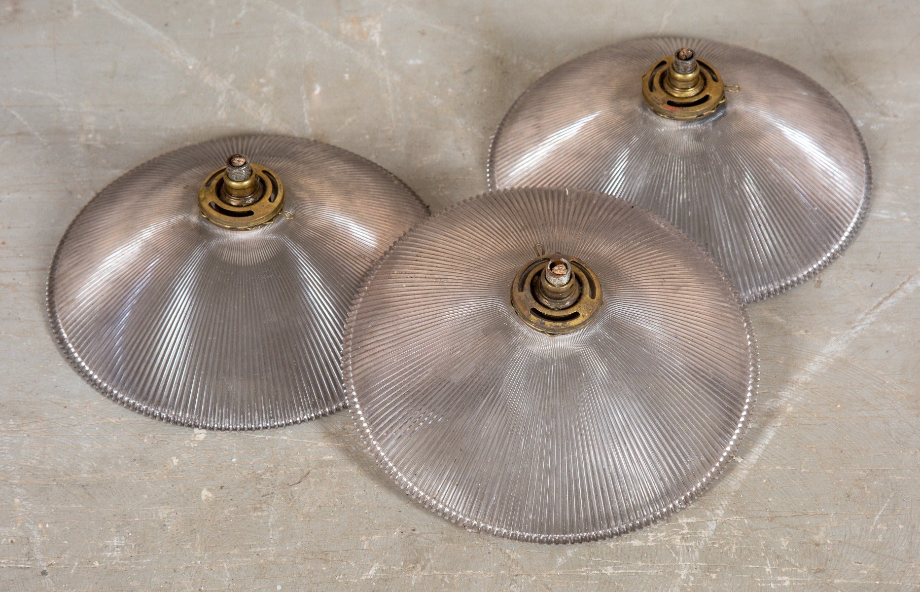 one of three original and intact hard to find holophane glass company prismatic reflector and matching socket
