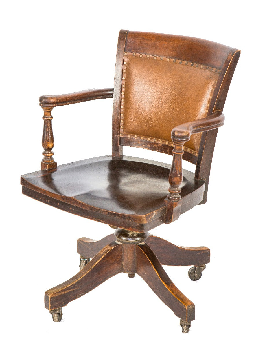 late 19th or early 20th century adjustable johnson office desk chair comprised of solid birch wood with original cushion