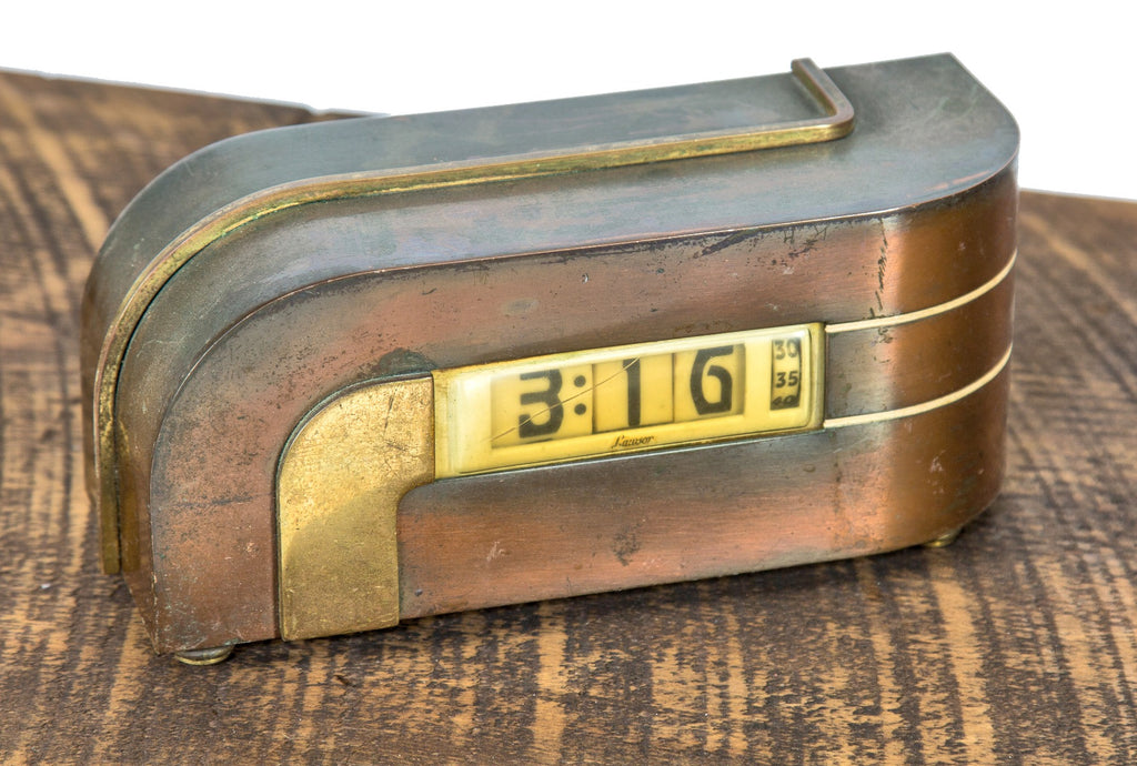 highly slight after american depression-era kem weber-designed "zephyr" streamlined style analog clock with original finish