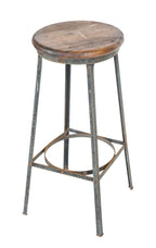 four-legged depression-era antique american industrial machine shop factory stool with solid maple wood seat