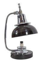 refinished highly sought after 1930's art deco machine age polished chrome and black enameled table lamp with distinctive speed rings