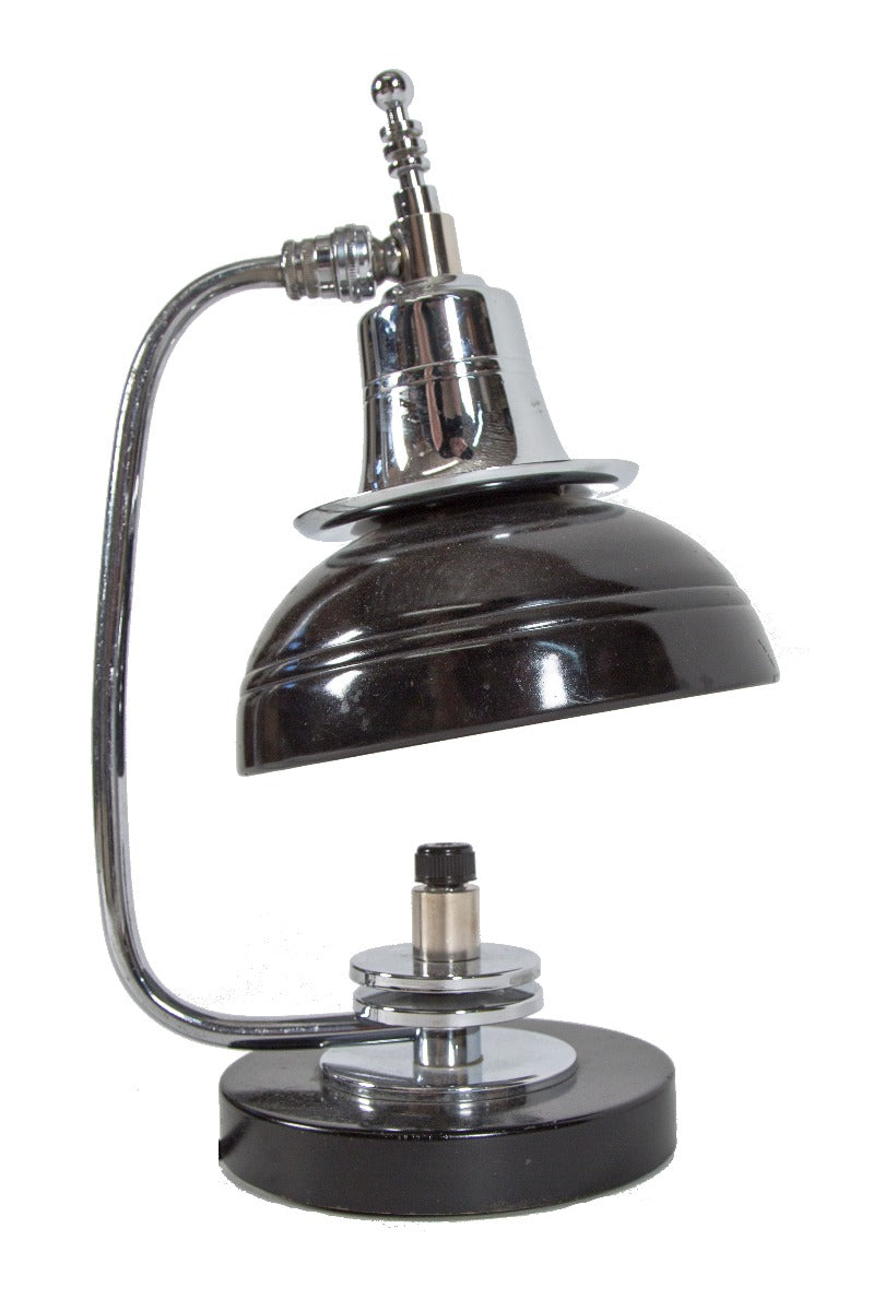 refinished highly sought after 1930's art deco machine age polished chrome and black enameled table lamp with distinctive speed rings