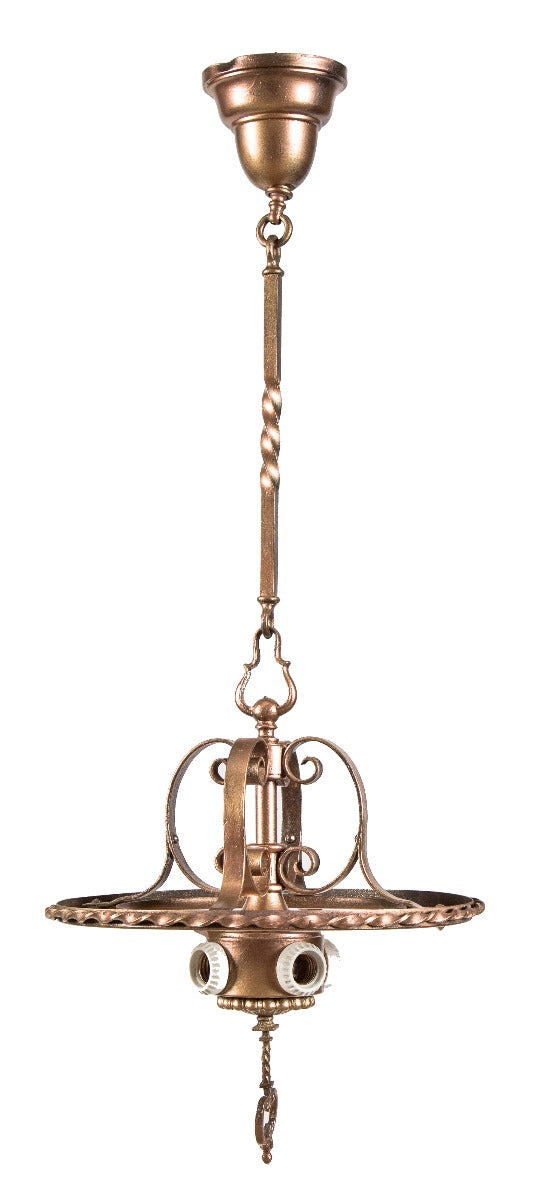 one of several original early 20th century logan square interior hanging wrought iron lights with barebulb cluster sockets