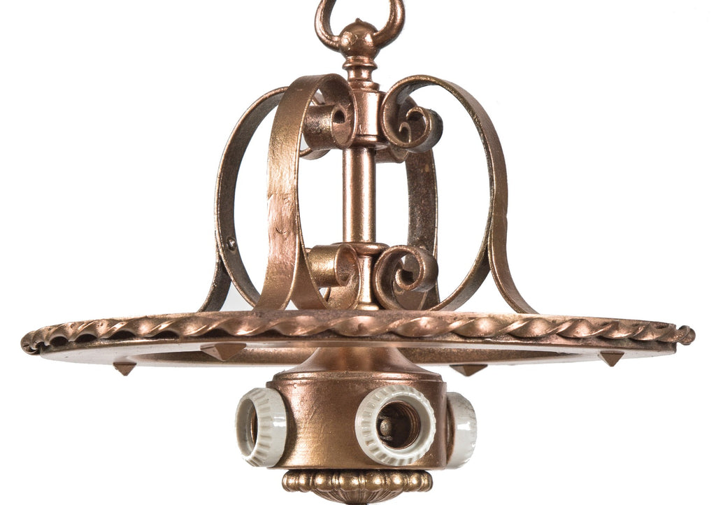 one of several original early 20th century logan square interior hanging wrought iron lights with barebulb cluster sockets