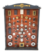 exceptionally rare all original american depression-era harvey hubbell product line display cabinet with original finish